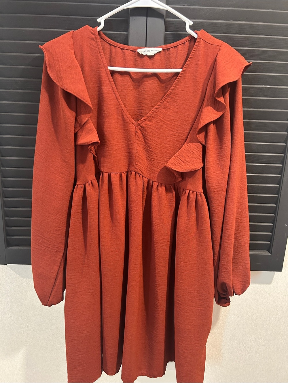 Newbury Kustom Rust Orange V‑Neck Ruffle Long Sleeve Dress